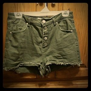 Green buttoned up shorts